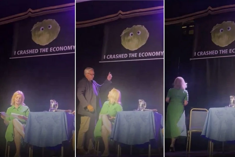 liz-truss-storms-off-stage-as-ex-pm-s-event-interrupted-by-lettuce-prank.webp